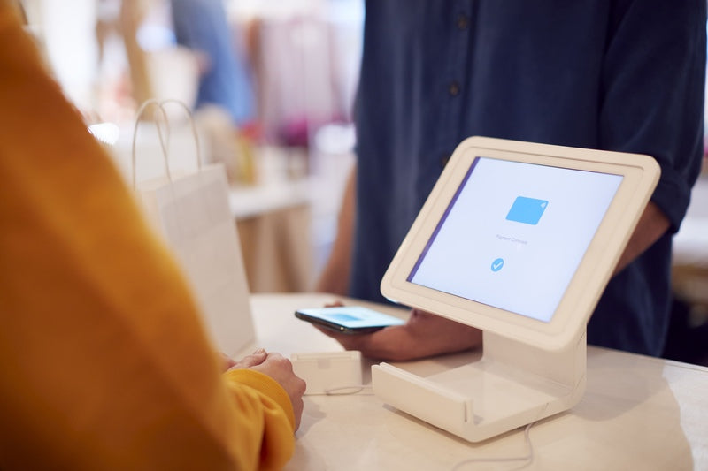 Close up of contactless payment, retail kiosk